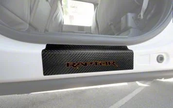 Rear Door Sill Protection with Raptor Logo; Raw Carbon Fiber; Black and Orange (15-26 F-150 SuperCrew)