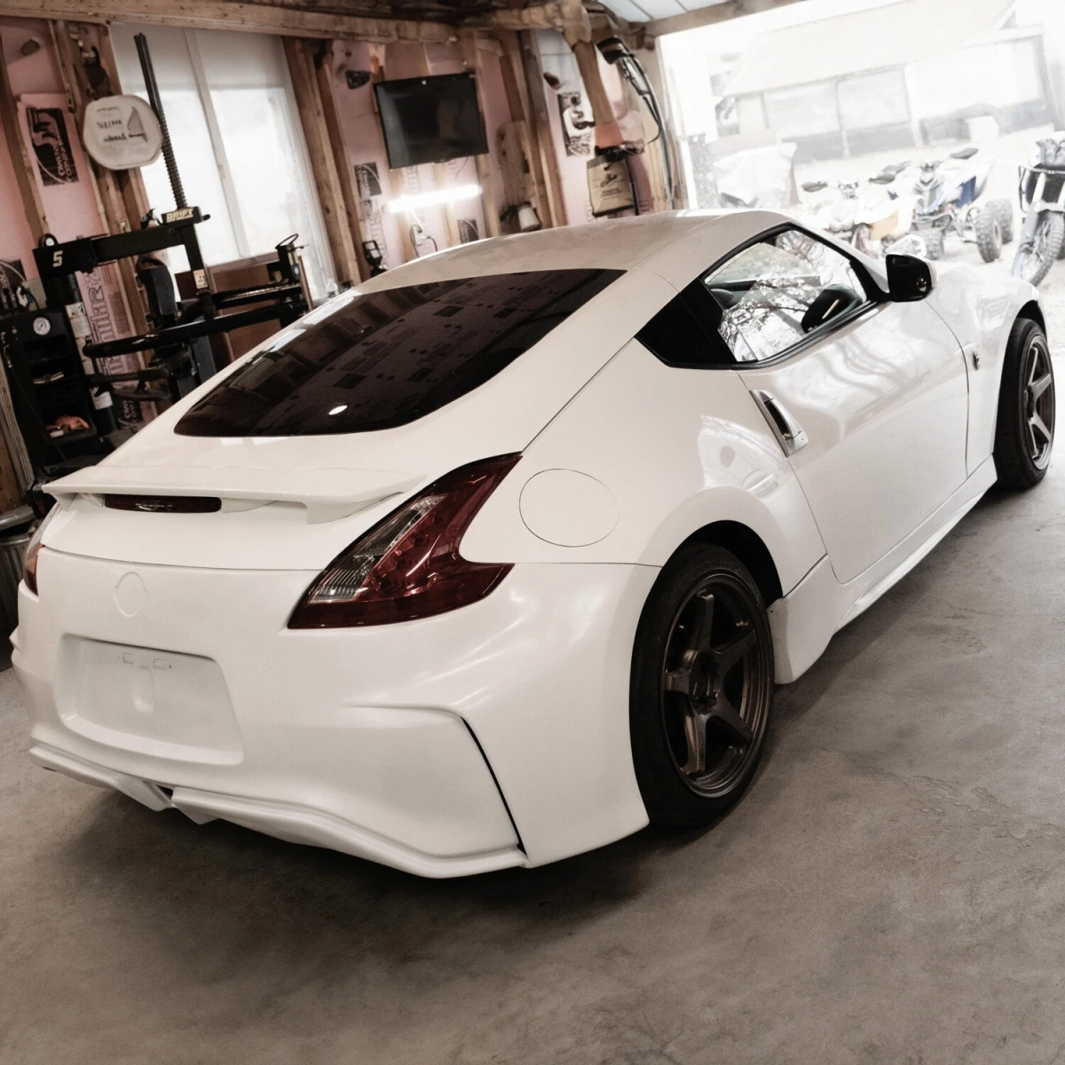 Nissan 370Z 2009-2020 Nismo V2 Style 1 Piece Polyurethane Rear Bumper - 37-6916