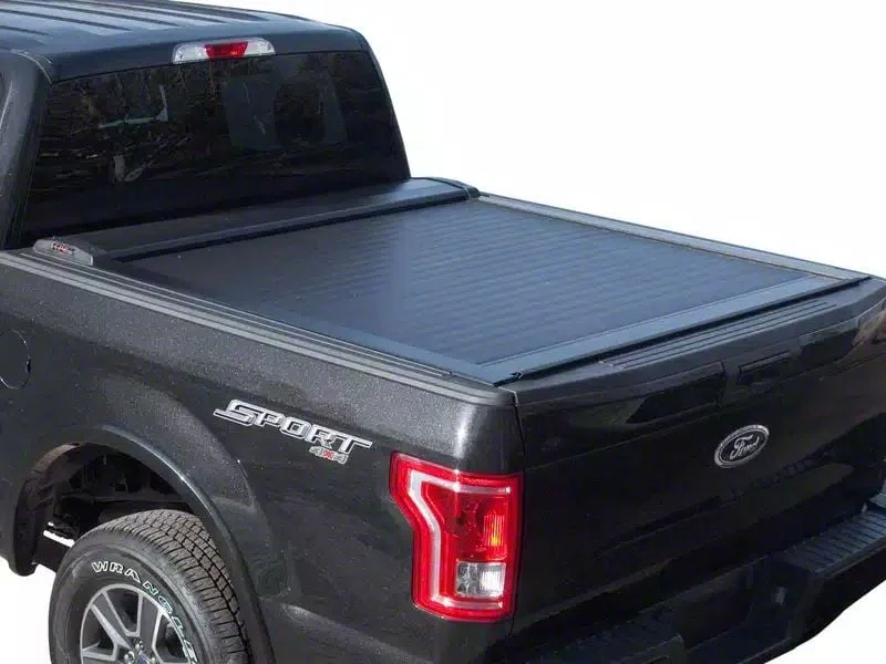 Pace Edwards SwitchBlade Retractable Bed Cover; Gloss Black with ArmorTek Vinyl Deck (20-26 Silverado 2500 HD w/ 6.90-Foot Standard Box)